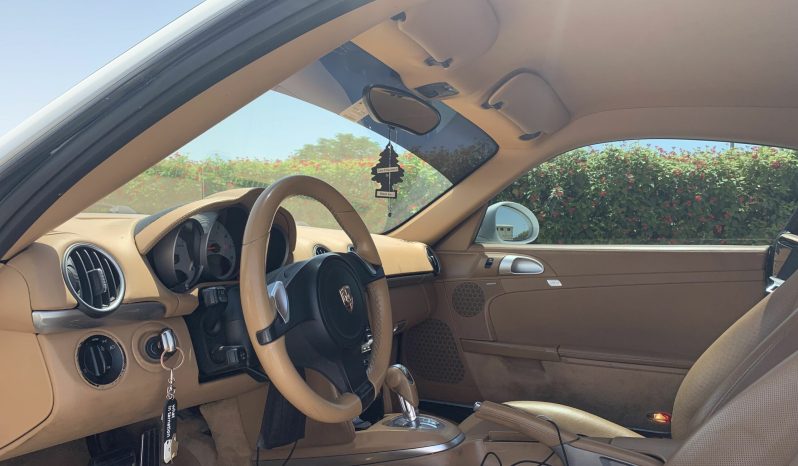 
								Porsche Cayman S full									